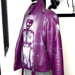 Graffiti studded leather jacket